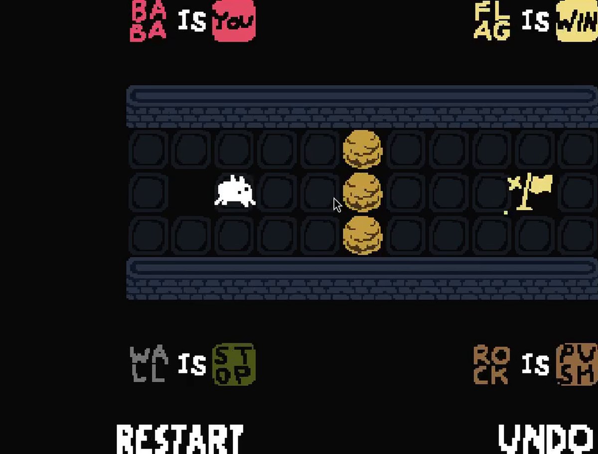 Fan-made Scratch remake of Baba Is You: the white character has moved right and stands next to the middle of the three rocks.